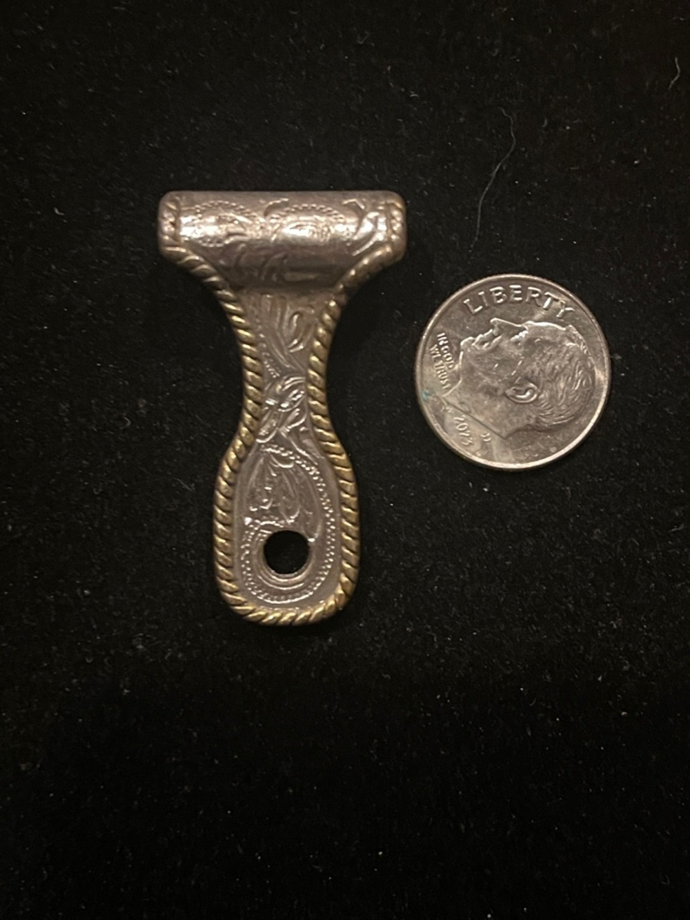 Ornate Silver Base Metal and Brass Concho Bail.